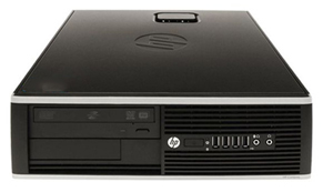 An HP Compaq desktop PC lying flat, angled down facing forward