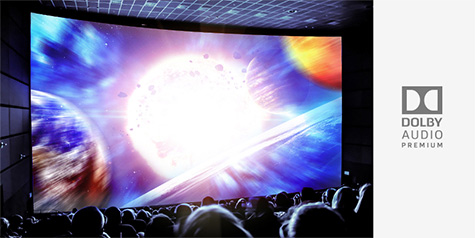 A movie theater audience viewing the explosion of the sun on screen