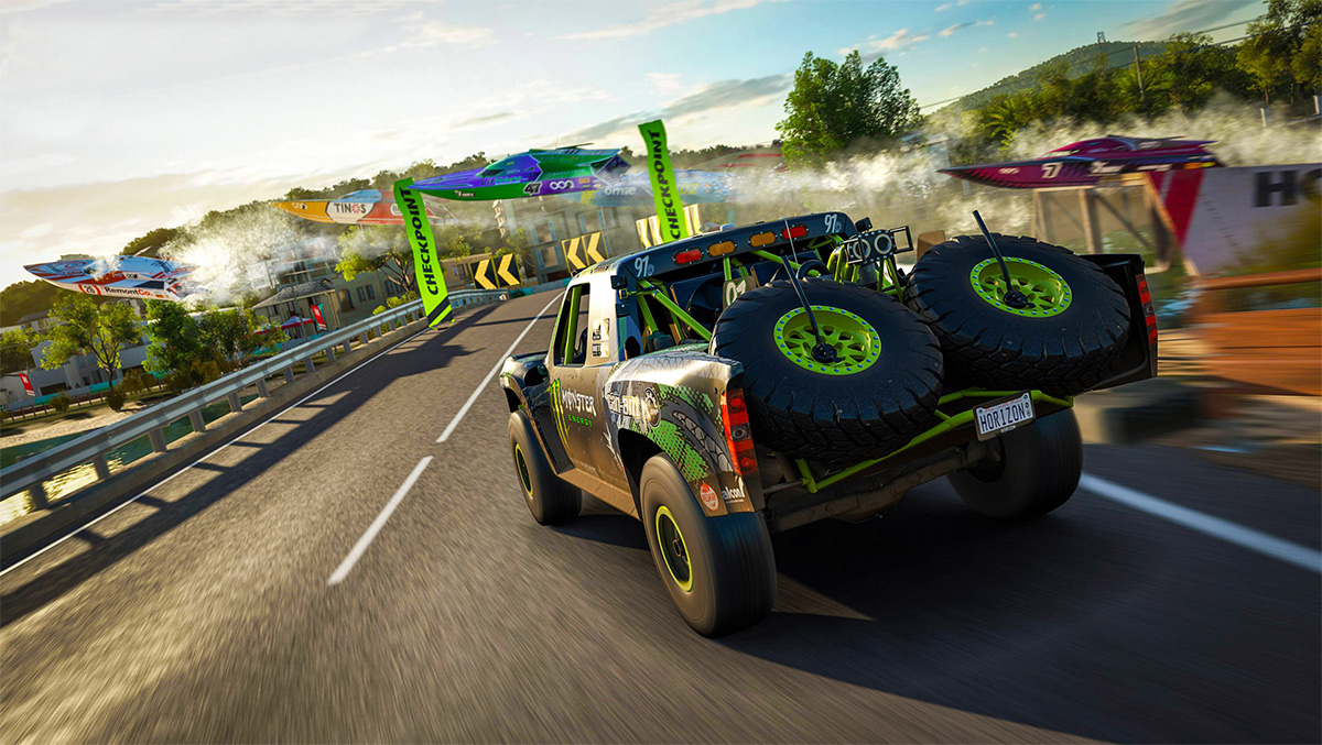 A car racing through street bridge with speedy boats flying over