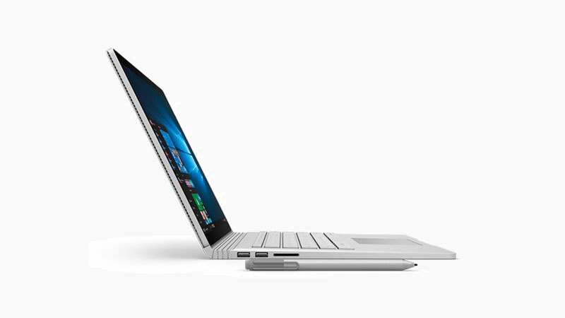 Surface Book angled to right beside a Surface Pen