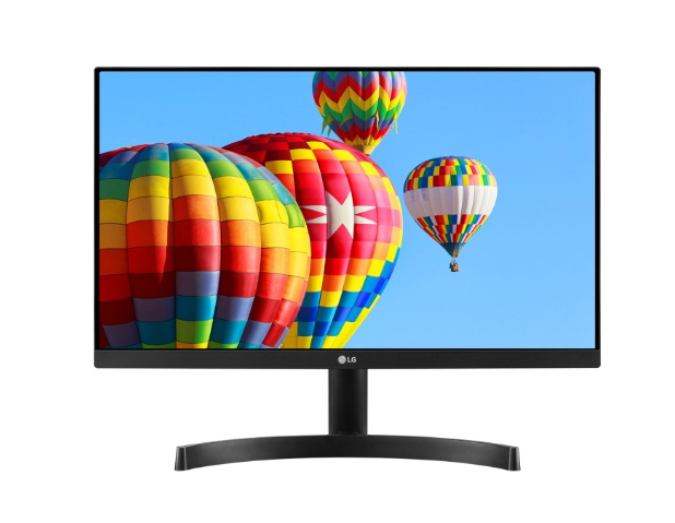 LG 22MK600M-B monitor facing forward with its screen showing hot-air balloons flying in a blue sky