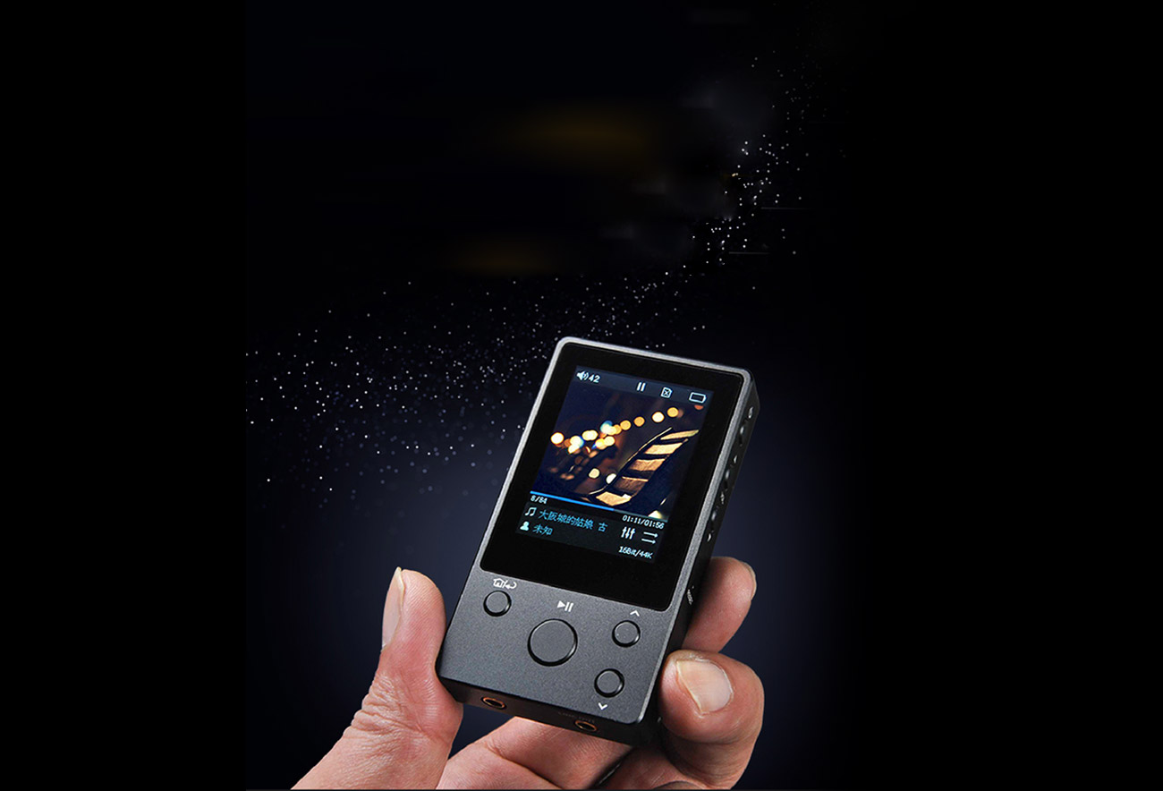 A hand holding the NANO D3 music player with text that reads: high fidelity lossless music player - can make you enjoy wonderful music in a square-inch box