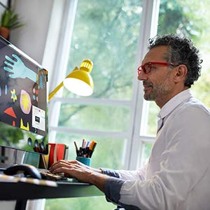 An old man enjoys brilliant 4K Ultra HD visuals