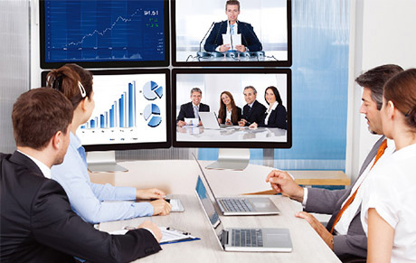 Office Workers Conducting a Video Chat Meeting