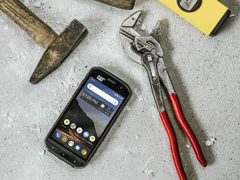 CAT S48c smarpthone next to hand tools