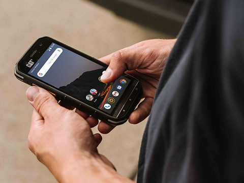 CAT S48c Smartphone Being Held in Someone's Hands