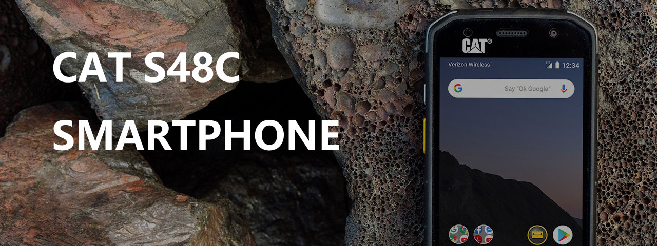 CAT S48c Smartphone Next to Porous Rocks