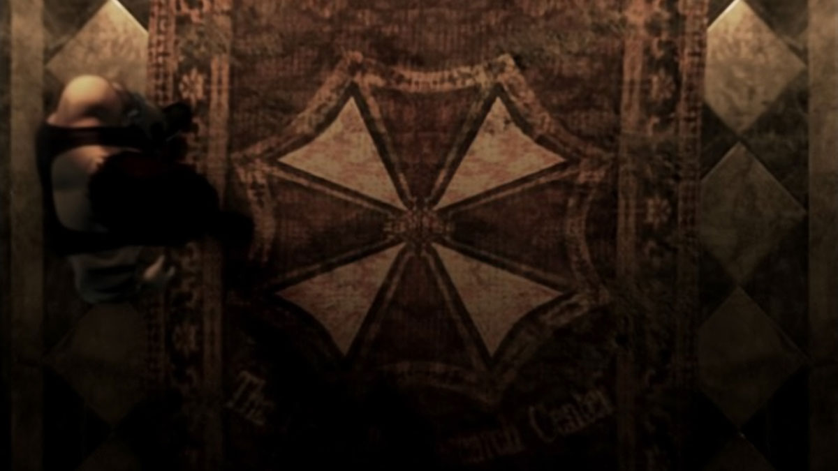 Resident Evil Origins Collection Screenshot Showing Overhead Shot of Billy Coen Examining the Umbrella Logo on a Rug