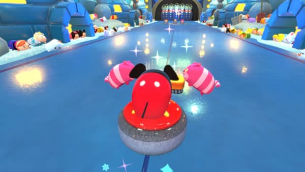 Mickey tsum tsum going through a curling lane