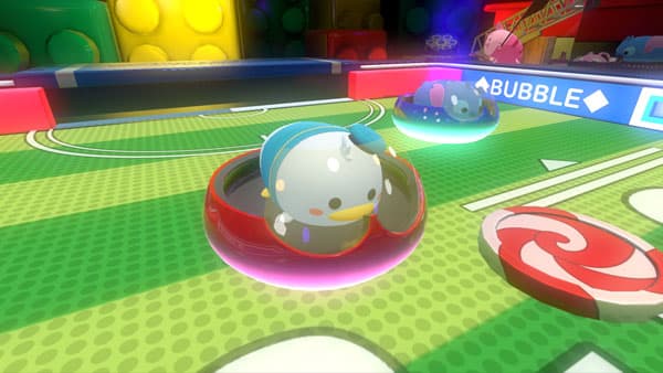 Donald and Stitch tsum tsum on a soccer air hockey field