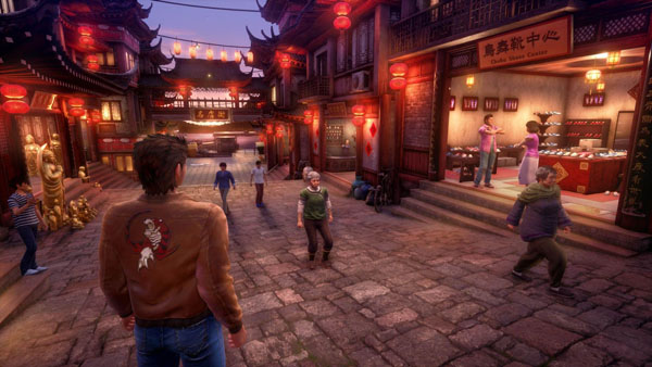 Shenmue 3 Screenshot Showing Ryo in a City Street at Twilight Hour
