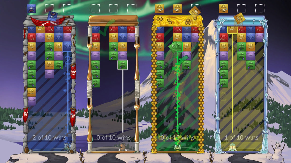Tumblestone screenshot showing four lanes of play with a large snow-covered mountain in the background