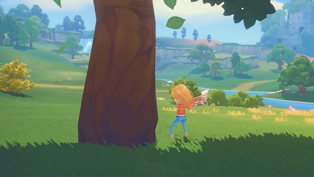 My Time At Portia Screenshot Showing the Main Male Character Attacking a Creature Underground