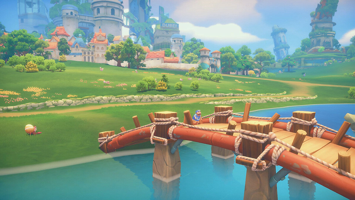 My Time At Portia Screenshot Showing a Bridge Over Water and a Castle in the Distance