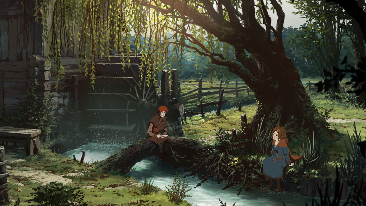 Philip and Aleina sitting outside next to a water mill