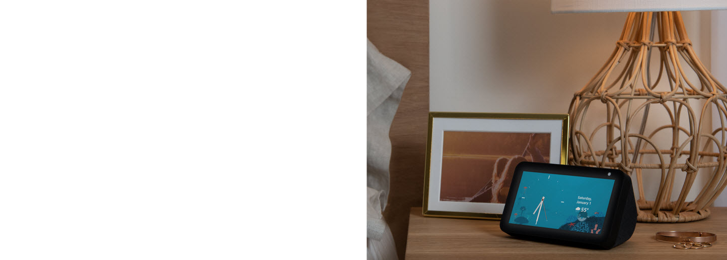 Echo Show 5 placed beside a photo frame