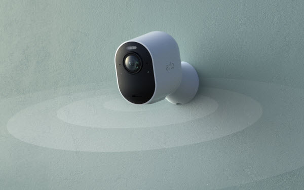 arlo camera angled to the left with circle wave graphics coming from the bottom 