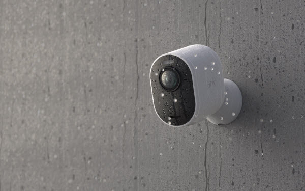 mounted arlo camera with snow falling