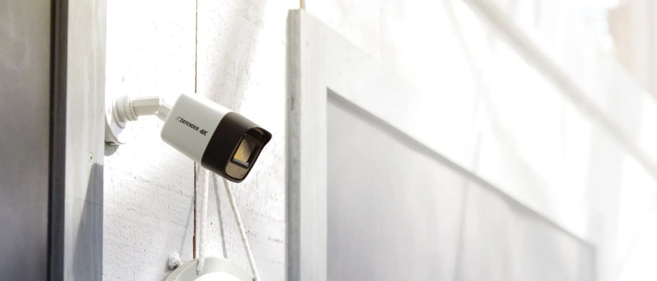 Defender 4K Wired Security Camera mounted on the wall