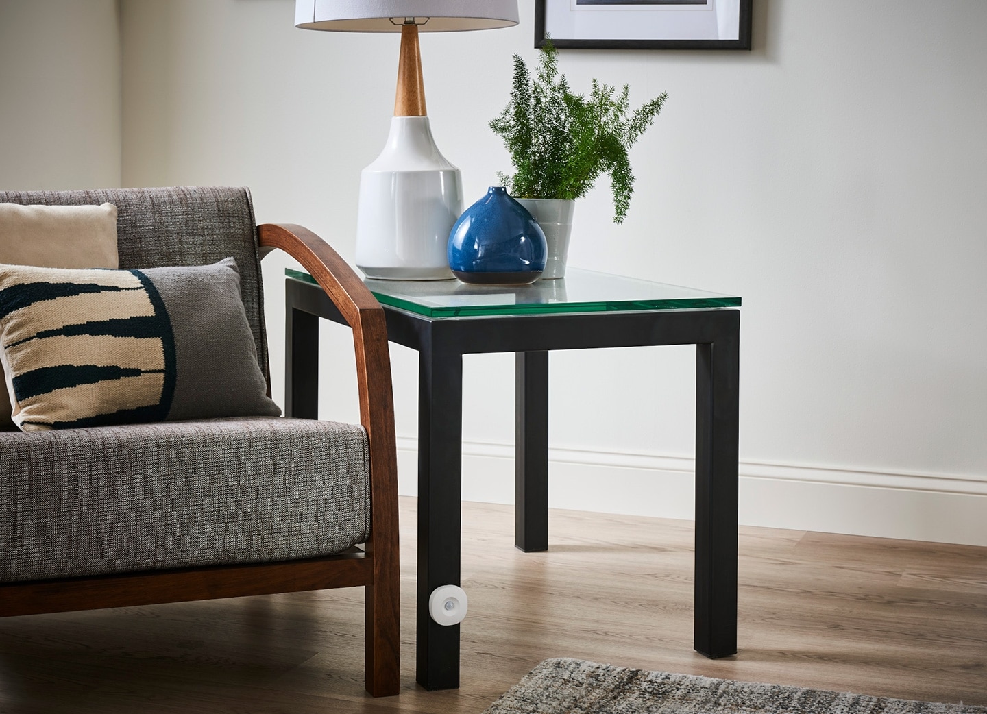 Samsung SmartThings Motion Sensor Installed on a Living Room Side Table