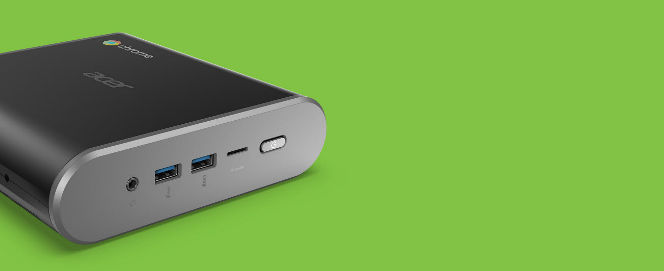 Acer Chromebox CXI3 angled to right in a green background
