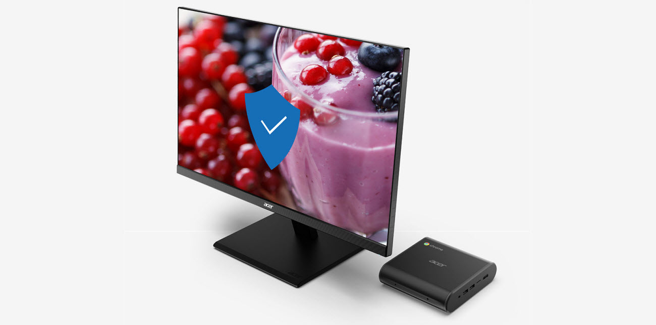Acer Chromebox CXI3 alongside an Acer monitor