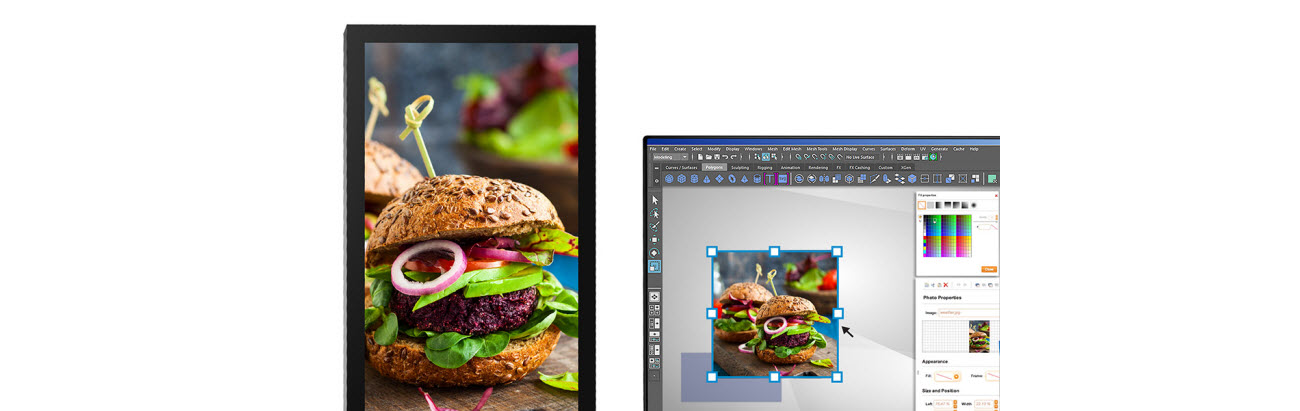 two monitors showinng interfaces of a photo eidting software