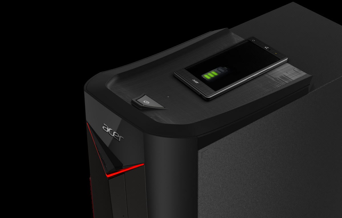 A Phone Charging on Top of the Acer Nitro 50