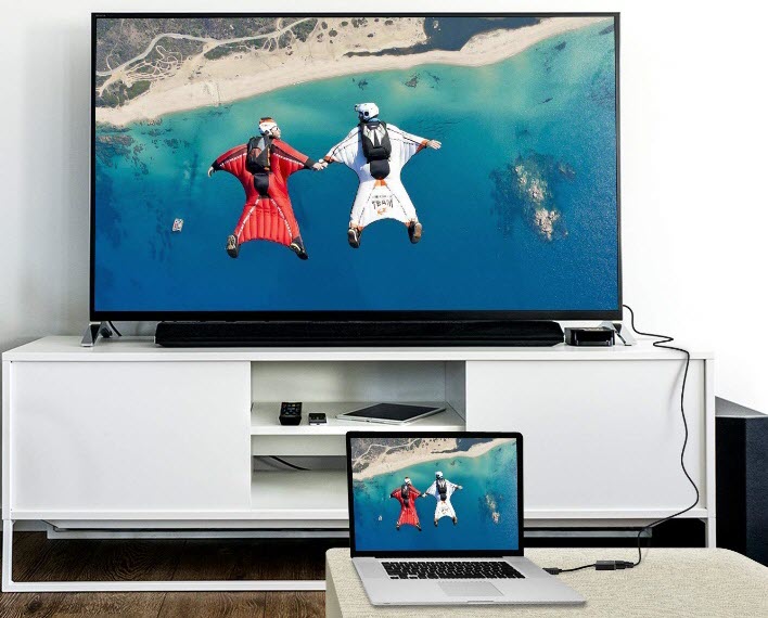 a laptop connected to a TV via Mirror Mode with Kaybles DVI-to-DisplayPort