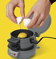 Crack an egg onto cooking plate