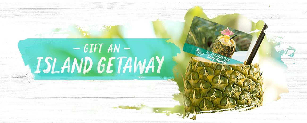 A Bahama Breeze Gift Card is in a pineapple bowl