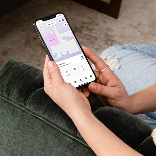 User is using an app on phone to control Neato D8