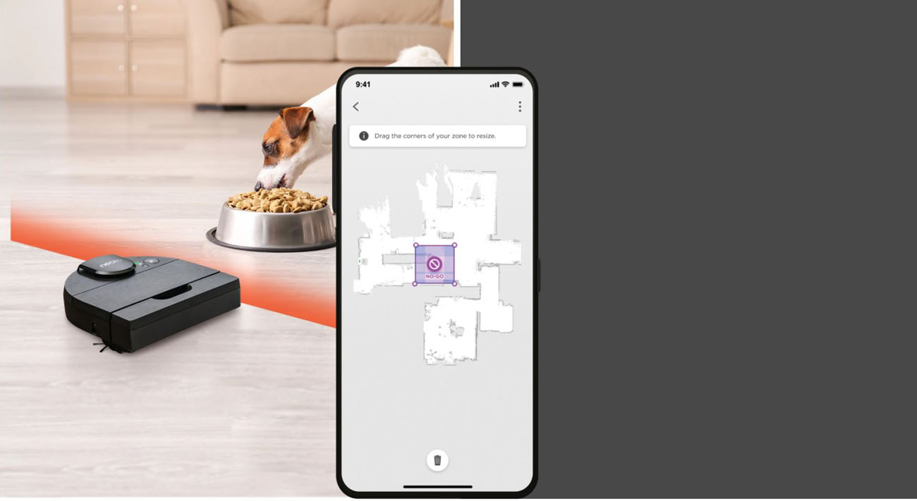 A zone is marked via app on a floor plan to not let Neato D9 enter which is against a background of real-world robot moving along the marked line.