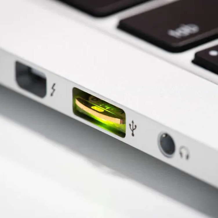 YubiKey 5 Nano FIPS sitting flush in a laptop USB-A port