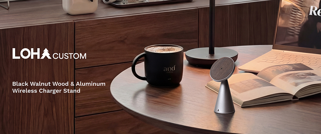 Loha Custom black walnut wood and aluminum wireless charger stand on a warm desk
