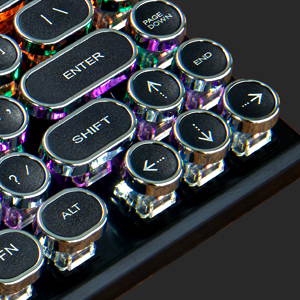 Round keycaps with metallic silver accents