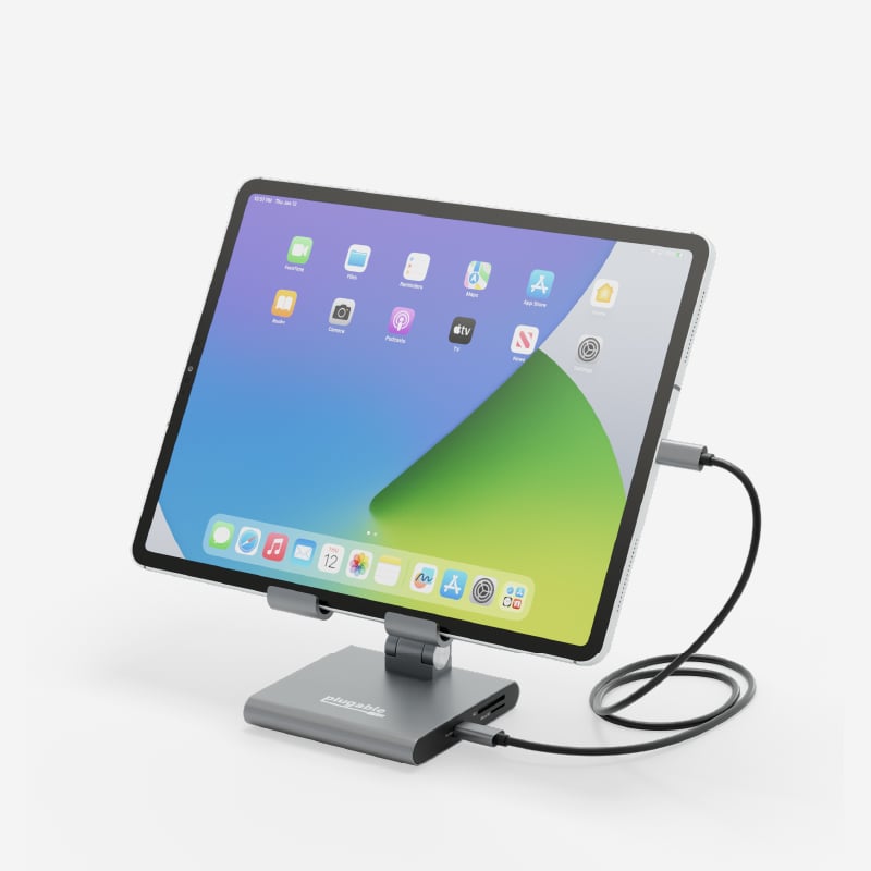 Dock with iPad on stand, connected with included USB C cable