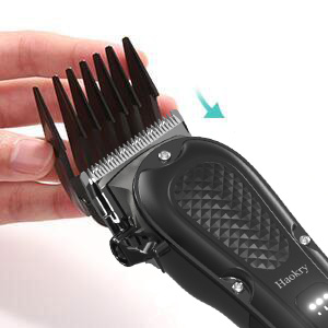 Step 1:Put the fuselage up Step 2:Push the hair limiting comb into the blade according to the direct