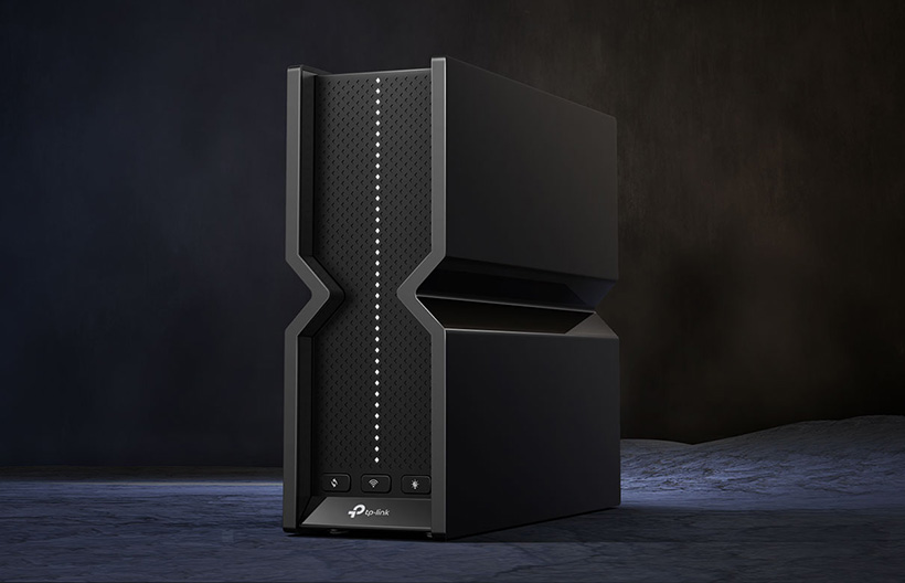 TP-Link Archer BE550 router lifestyle image on dark background