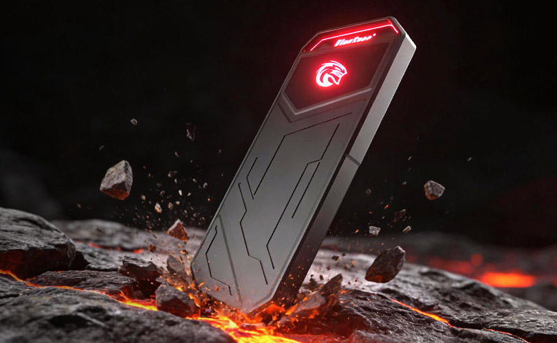 KingSpec SSD with red glowing logo on rocky lava terrain showing pressure-resistant shell
