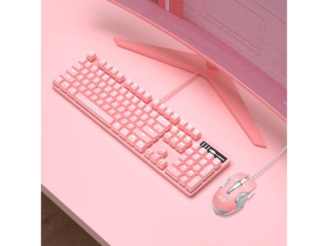 pink laptop with white keyboard