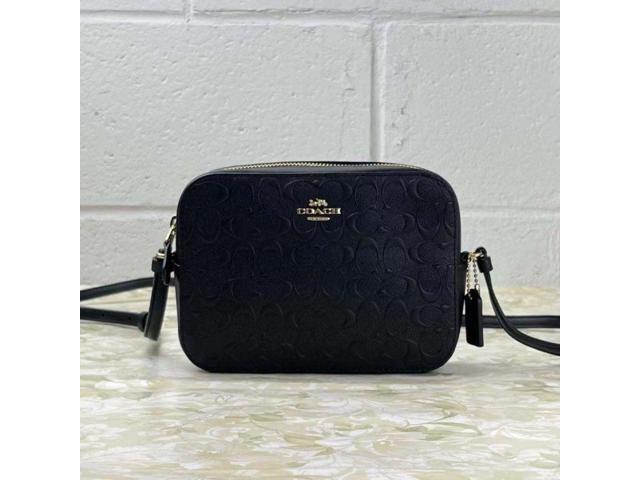 coach camera bag in signature embossed leather