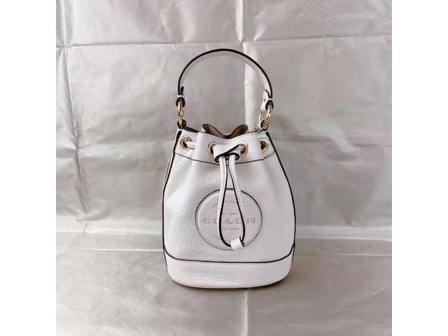 dempsey drawstring bucket bag 15 with coach patch