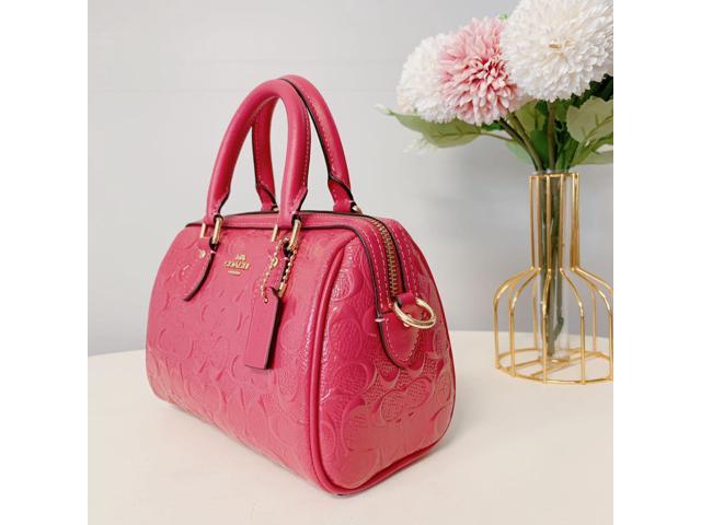 COACH Women's Mini Rowan Crossbody in Signature Patent Leather, Strawberry  Haze : : Clothing, Shoes & Accessories