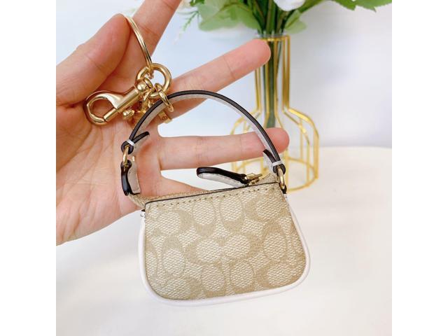 Coach Outlet Mini Nolita Bag Charm In Signature Canvas - ShopStyle Key  Chains