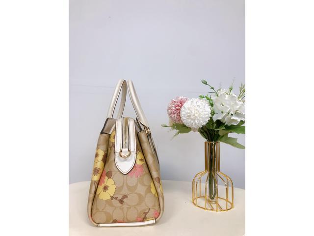 COACH®  Darcie Carryall In Signature Canvas With Floral Cluster Print