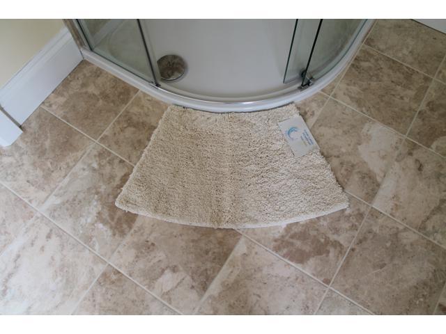 curved shower mat