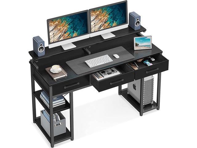 desk with raised monitor shelf