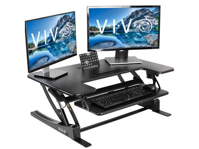 Photo 1 of VIVO Black Height Adjustable Stand up Desk Converter | 36" Sit to Stand Tabletop Monitor Riser