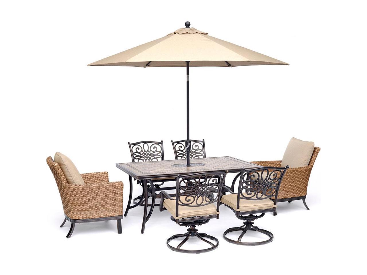 Hanover Monaco 7 Piece Patio Dining Set With 4 Swivel Rockers 2 Woven Arm Chairs A 40 X 68 Tile Top Table And A 9 Ft Umbrella Mondn7pccswos2 Su Newegg Com